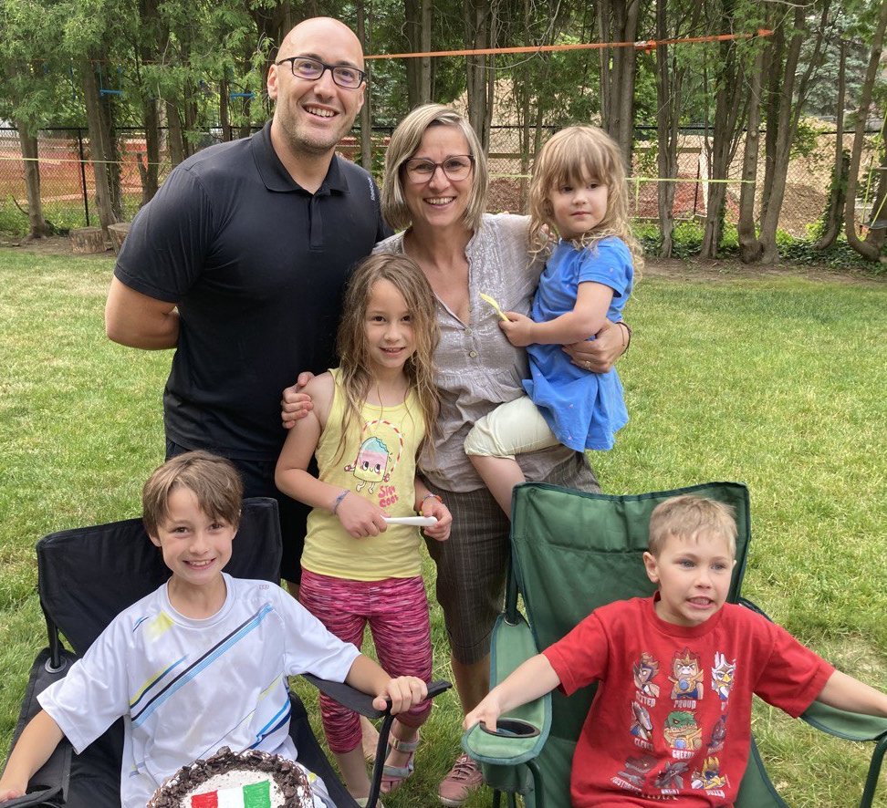 Picture of Checco and Carmen Testa and their four children